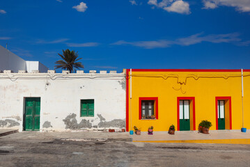 View of a typical colorful house of Linosa