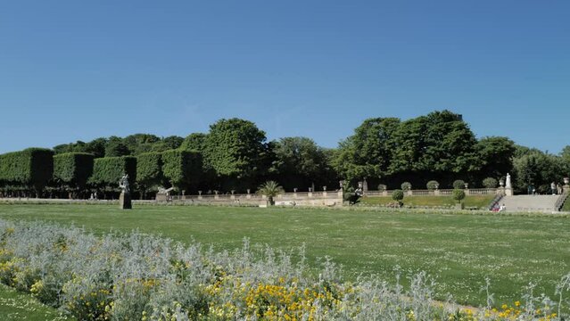 People walking in the Luxembourg garden in Paris