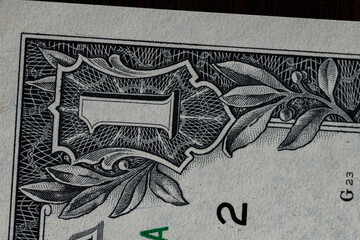 Fragment of one American dollar banknote close-up.