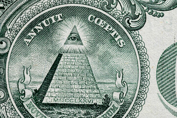 Fragment of one American dollar banknote close-up.