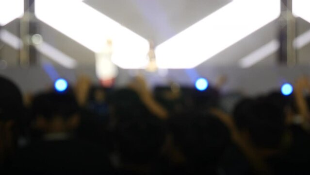 Defocused view of The audience cheered, rock music, pop music, slow music, rap music show
