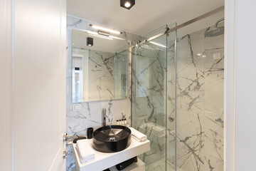 Interior of a luxury bathroom glass shower cabin