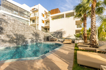 Sea hotel resort with swimming pool in the morning