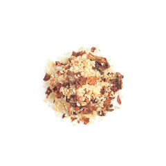Top view of heap of rice, spices and dried vegetables for pilaf