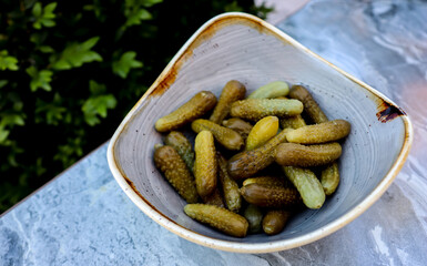 bowl of pickled cucumbers