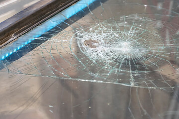 Glass roof with broken glass top view
