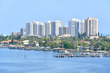 High rises mixed with single family residential homes in Daytona Beach Shores along the Halifax intracoastal waterway in Florida