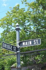 Bridge and Main streets sign post.
