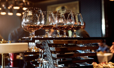 glasses of cognac.