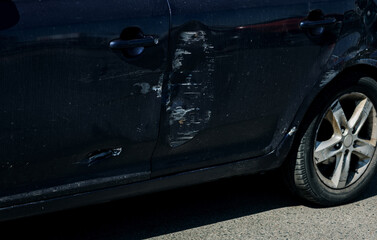 Obraz na płótnie Canvas scratch and dent on the car