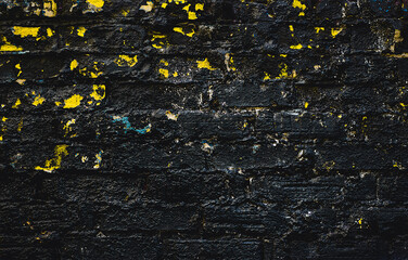 Obraz premium Dark brick. Black texture. Stone background. Dark marble. Rock texture. Rock surface with cracks. Rock pile. Paint spots wall. Grunge Rough structure. Abstract texture.