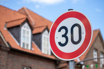 30km/h speed limit sign on the street