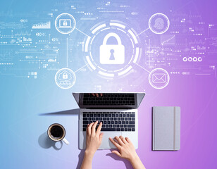 Internet network security concept with person using a laptop computer