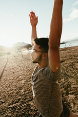 Young man practicing yoga