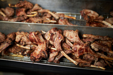 Ready meat in iron containers. grilled meat 