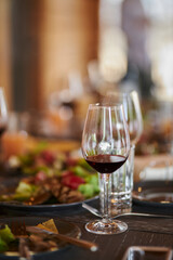 Glass of red wine on the table