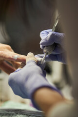 manicurist makes a manicure. The process of creating a quality manicure. Personal care. Beauty industry 
