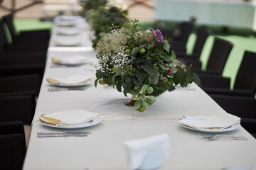 Composition of green dried flowers and wildflowers. Bouquet of green dried flowers and half flowers close up