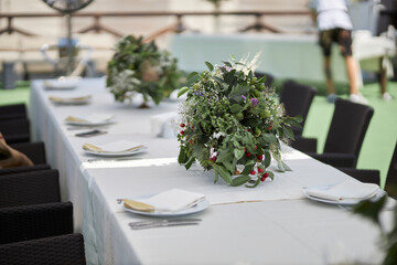 Composition of green dried flowers and wildflowers. Bouquet of green dried flowers and half flowers close up