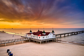 drone view of famous old pier of Ahlbeck on island of Usedom in the baltic sea - obrazy, fototapety, plakaty