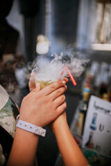 Drink with dry ice. Smoke cocktail.