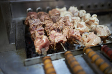 juicy pork skewers. Barbecue cooking. meat close up 