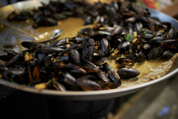 Mussels preparation. Mussels in sauce. shellfish