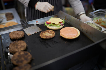 Cooking cutlets for a burger. Their beef cutlets, cooking a burger