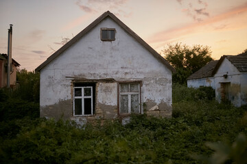 Fototapeta na wymiar Old rural house. In warm colors. House
