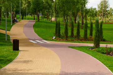 Paving stone paths with colored bricks with bicycle markings