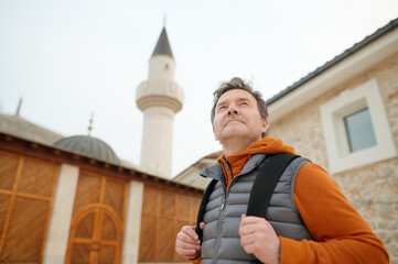 Mature tourist enjoy a stroll through the old town of Trebinje, Bosnia and Herzegovina.