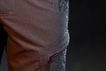 men's waterproof pants. Men's pants close-up. Waterproof fabric
