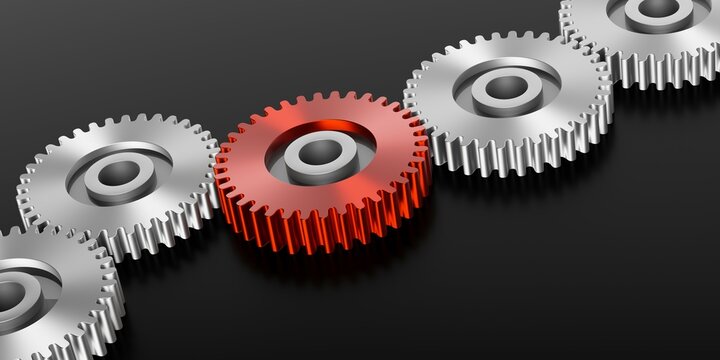 Row of shiny metal gears or cogwheels with one red on black background with copy space, modern industry, process or engineering concept template
