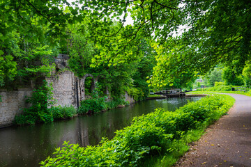 Fototapeta na wymiar old mill along the canal