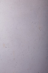 White painted wooden background with black spraying, texture, abstract backdrop, copy space