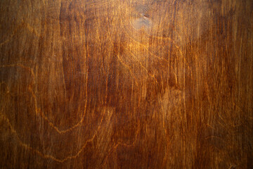 Photo of the texture of premium mahogany covered with glossy varnish. Clean wooden background for...