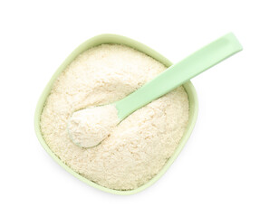 Dry healthy baby food in bowl on white background, top view