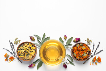 Freshly brewed tea and dried herbs on white background, top view. Space for text - obrazy, fototapety, plakaty