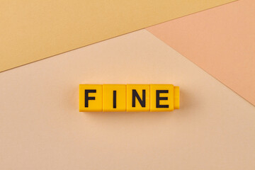 Word fine written on yellow blocks against color background. Very high quality concept.