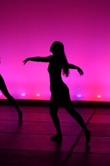 Fototapeta na wymiar silhouette of a dancing girl