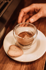 cup of coffee with cookies