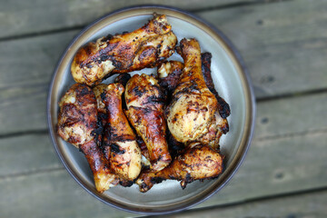 Grilled chicken drums. BBQ background. Summer barbeque.