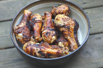 Grilled chicken drums. BBQ background. Summer barbeque.