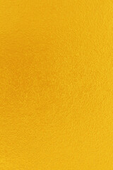 Gold or yellow paint on cement wall texture  background.