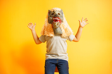 disguised kid with a wolf mask