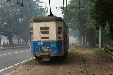 Kolkata, West Bengal, India - 23rd January 2020 : Electric Tram is passing through tram lines at...
