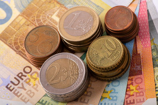 Euro banknotes and coins of various denominations