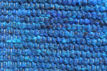 Shades of blue wool yarn cloth abstract background. Surface of fabric texture in sky blue ,sea and ocean color. 