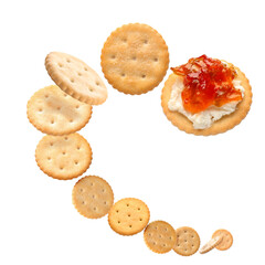 Many tasty crackers isolated on white