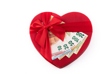Gift box in the form of a symbol of a human heart and euro banknotes